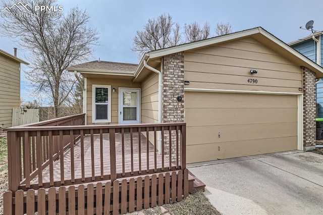 4790 Hennings Dr, Colorado Springs, CO 80911 - single story home with a deck and concrete driveway