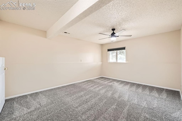 4790 Hennings Dr, Colorado Springs, CO 80911 - carpeted empty room with ceiling fan, a textured ceiling, baseboards, and beam ceiling