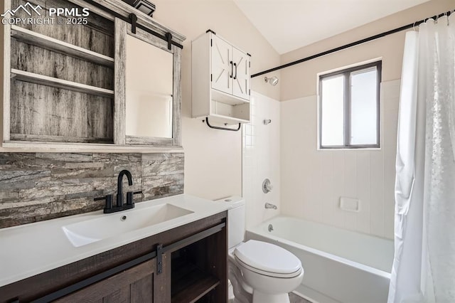 4790 Hennings Dr, Colorado Springs, CO 80911 - full bathroom featuring toilet, shower / bath combo with shower curtain, decorative backsplash, and vanity