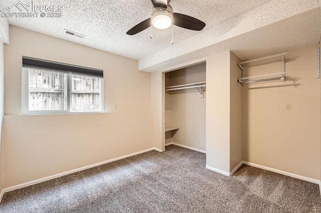 4790 Hennings Dr, Colorado Springs, CO 80911 - unfurnished bedroom featuring carpet floors, a closet, a textured ceiling, ceiling fan, and baseboards