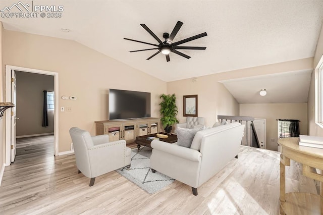 4790 Hennings Dr, Colorado Springs, CO 80911 - living area with vaulted ceiling, ceiling fan, light wood finished floors, and baseboards