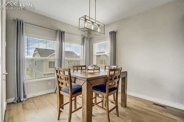 6898 Sedgerock Ln, Colorado Springs, CO 80927 - dining space featuring light wood finished floors and baseboards