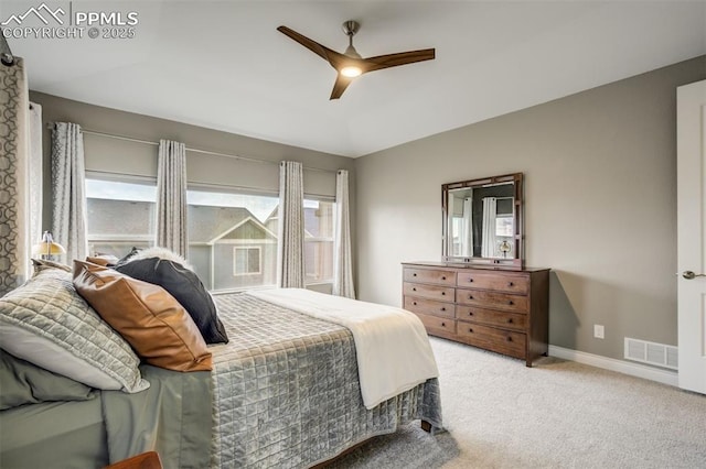 6898 Sedgerock Ln, Colorado Springs, CO 80927 - carpeted bedroom with multiple windows, a ceiling fan, and baseboards