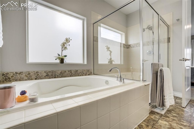 6898 Sedgerock Ln, Colorado Springs, CO 80927 - full bathroom featuring a stall shower and a garden tub