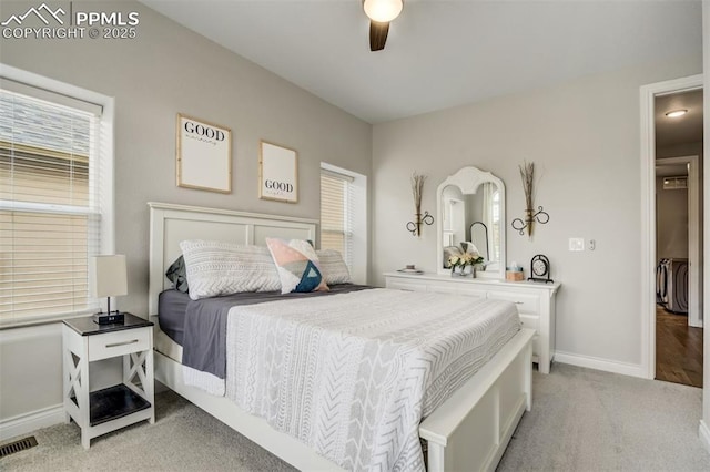 6898 Sedgerock Ln, Colorado Springs, CO 80927 - bedroom featuring light colored carpet, baseboards, multiple windows, and a ceiling fan