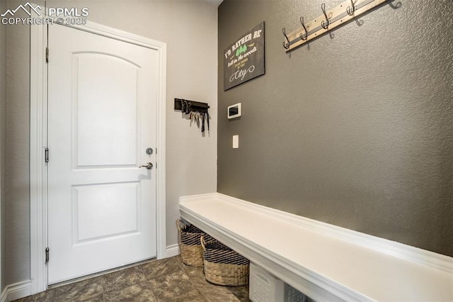 6898 Sedgerock Ln, Colorado Springs, CO 80927 - mudroom featuring baseboards