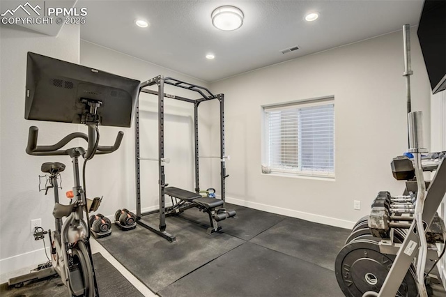 6898 Sedgerock Ln, Colorado Springs, CO 80927 - exercise room with baseboards and recessed lighting