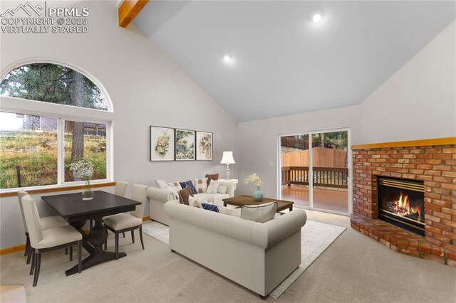 carpeted living room featuring high vaulted ceiling, a brick fireplace, beam ceiling, and recessed lighting