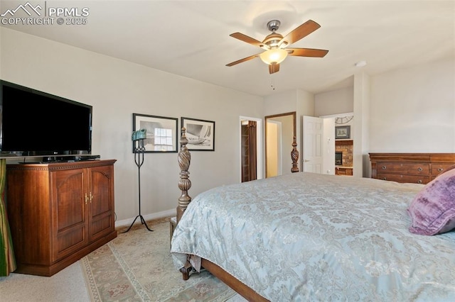 bedroom with baseboards, ceiling fan, and light colored carpet