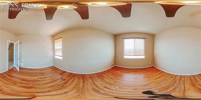 6018 Cumbre Vista Way, Colorado Springs, CO 80924 - empty room with plenty of natural light, baseboards, and wood finished floors