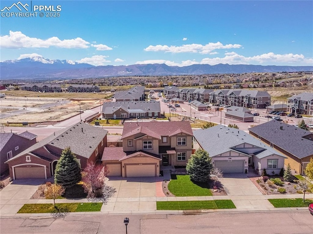 6018 Cumbre Vista Way, Colorado Springs, CO 80924 - aerial perspective of suburban area with a mountainous background