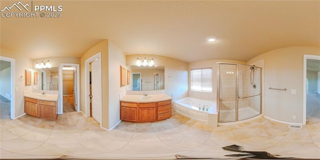 6018 Cumbre Vista Way, Colorado Springs, CO 80924 - bathroom featuring a shower stall, a bath, tile patterned flooring, and two vanities