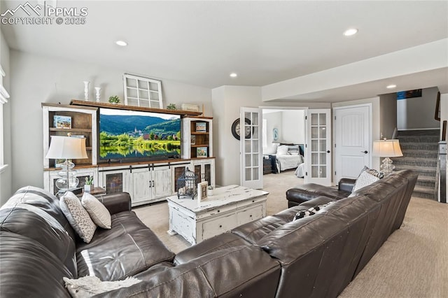 16231 Thunder Cat Way, Monument, CO 80132 - living room with french doors, light carpet, recessed lighting, and stairway