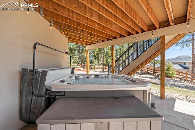 16231 Thunder Cat Way, Monument, CO 80132 - view of patio featuring a hot tub, stairs, and fence