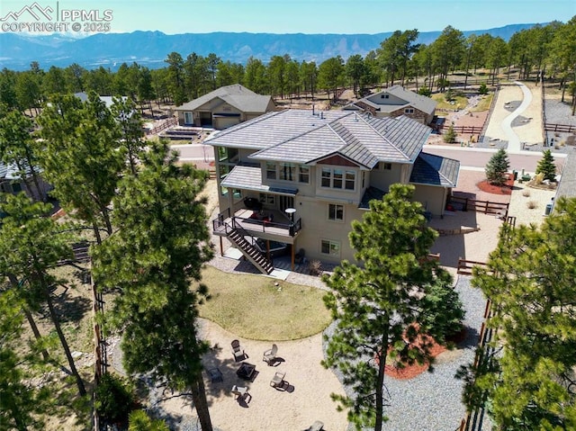 16231 Thunder Cat Way, Monument, CO 80132 - aerial view of property and surrounding area featuring a mountain backdrop