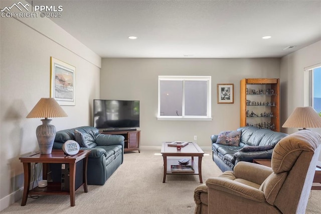 16420 Mountain Glory Dr, Monument, CO 80132 - living area with light carpet, baseboards, and recessed lighting