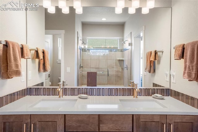 16420 Mountain Glory Dr, Monument, CO 80132 - full bath with toilet, a stall shower, and double vanity