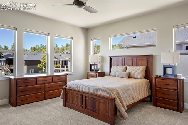 16420 Mountain Glory Dr, Monument, CO 80132 - bedroom with light colored carpet and ceiling fan