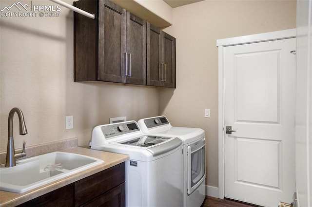 16420 Mountain Glory Dr, Monument, CO 80132 - laundry room featuring independent washer and dryer and cabinet space