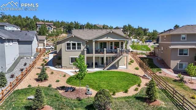 16420 Mountain Glory Dr, Monument, CO 80132 - rear view of house with stairs, a deck, stucco siding, a residential view, and a patio area