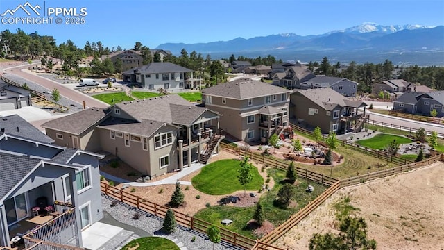 16420 Mountain Glory Dr, Monument, CO 80132 - aerial view of residential area with a mountainous background