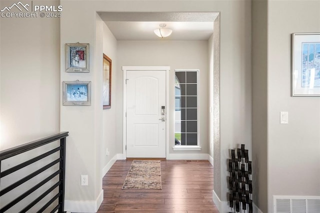 16420 Mountain Glory Dr, Monument, CO 80132 - foyer with hardwood / wood-style floors and baseboards