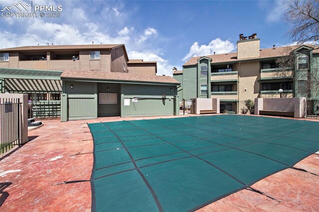124 W Rockrimmon Blvd Unit 103, Colorado Springs, CO 80919 - community pool with fence and a patio