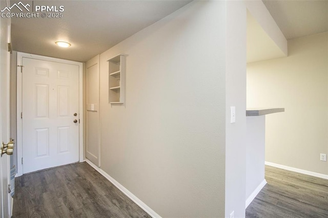 124 W Rockrimmon Blvd Unit 103, Colorado Springs, CO 80919 - hall featuring wood finished floors and baseboards