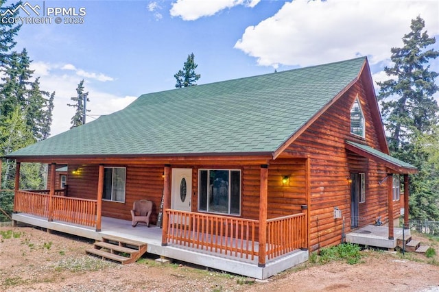 16 Echo Cir, Florissant, CO 80816 - view of front of home featuring roof with shingles and a porch