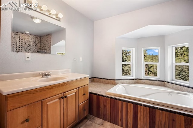 16 Echo Cir, Florissant, CO 80816 - full bathroom with vanity, a bath, and tile patterned floors