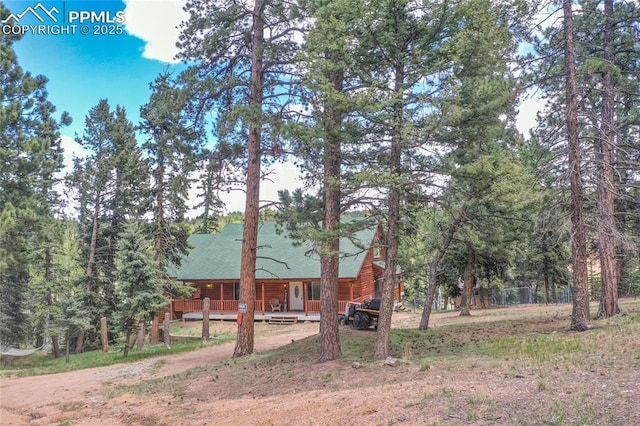 16 Echo Cir, Florissant, CO 80816 - view of front of house featuring dirt driveway and covered porch