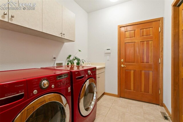 17575 Minglewood Trl, Monument, CO 80132 - laundry room with separate washer and dryer, cabinet space, and baseboards