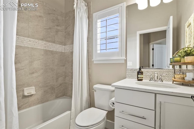full bathroom with decorative backsplash, vanity, shower / bath combo, and toilet
