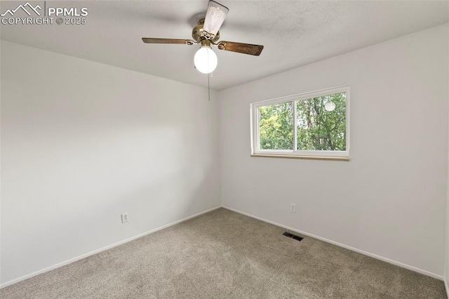 514 Dexter St, Colorado Springs, CO 80911 - carpeted spare room featuring baseboards and ceiling fan