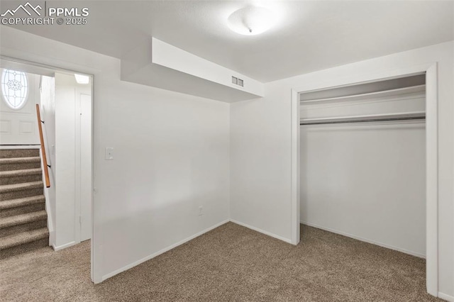 514 Dexter St, Colorado Springs, CO 80911 - unfurnished bedroom featuring carpet flooring, a closet, and baseboards