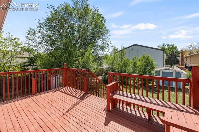 514 Dexter St, Colorado Springs, CO 80911 - deck with a storage shed, an outdoor structure, and a fenced backyard
