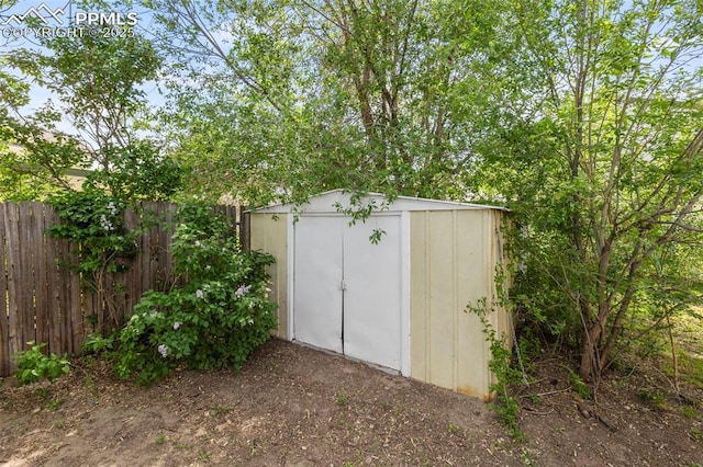 514 Dexter St, Colorado Springs, CO 80911 - view of shed featuring fence