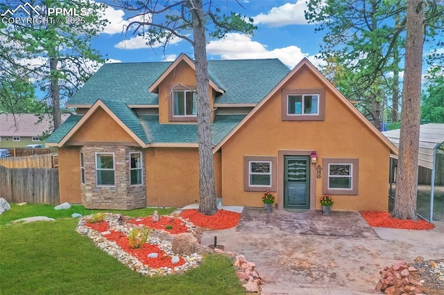 view of front facade featuring stone siding, stucco siding, and a shingled roof