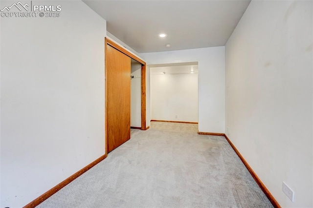 458 S Downing St, Denver, CO 80209 - corridor with light colored carpet and baseboards