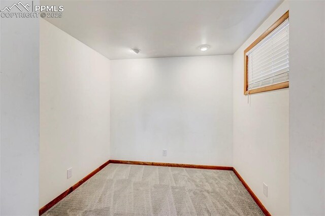 458 S Downing St, Denver, CO 80209 - unfurnished room with baseboards and carpet