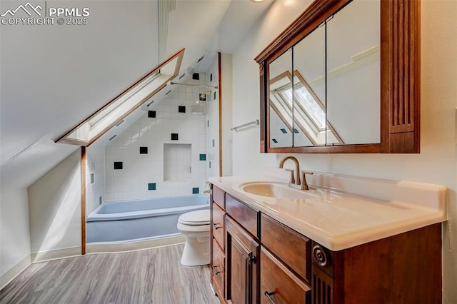 458 S Downing St, Denver, CO 80209 - full bath featuring a skylight, toilet, vanity, shower / bathtub combination, and wood finished floors