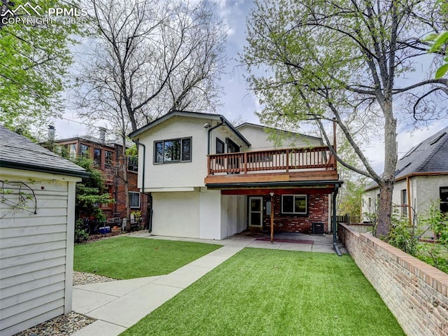 458 S Downing St, Denver, CO 80209 - back of property with a patio, a wooden deck, and stucco siding