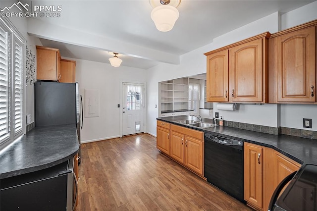 806 E Platte Ave, Colorado Springs, CO 80903 - kitchen featuring black dishwasher, a sink, dark countertops, range, and beamed ceiling