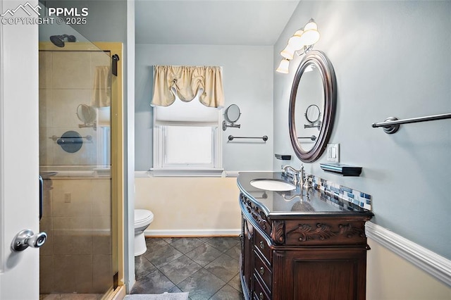806 E Platte Ave, Colorado Springs, CO 80903 - full bathroom with vanity, a shower stall, toilet, and baseboards