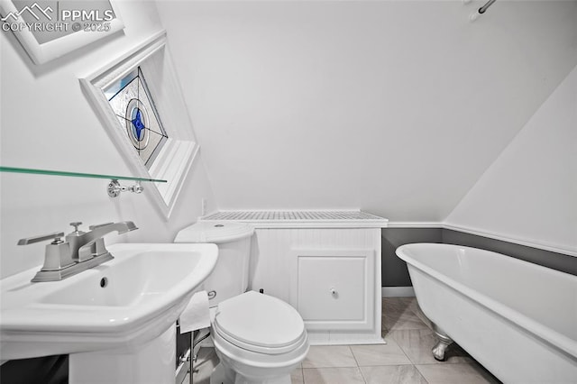 806 E Platte Ave, Colorado Springs, CO 80903 - full bath with a soaking tub, marble finish floors, a sink, and toilet