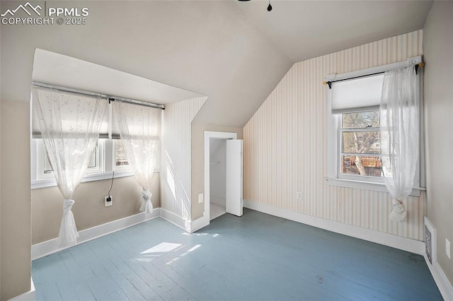 806 E Platte Ave, Colorado Springs, CO 80903 - additional living space featuring hardwood / wood-style flooring, lofted ceiling, and baseboards