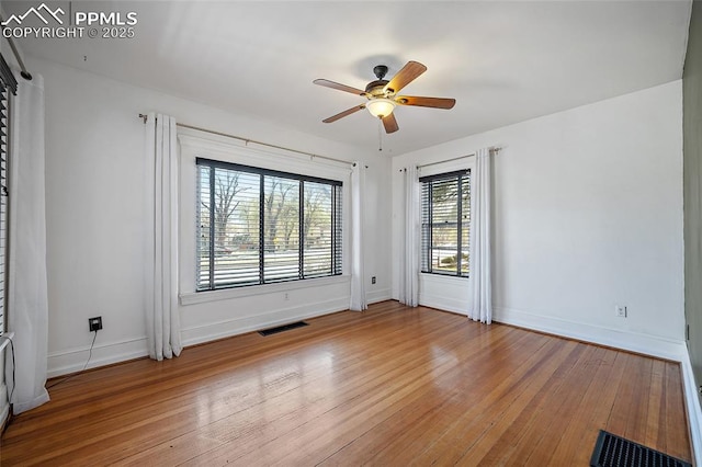 806 E Platte Ave, Colorado Springs, CO 80903 - spare room with wood finished floors, ceiling fan, and baseboards