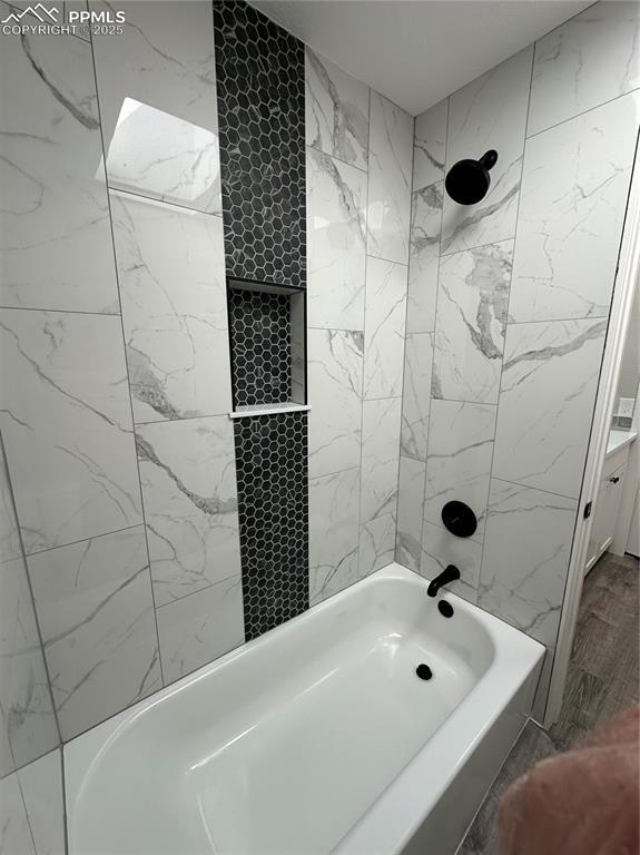 bathroom featuring bathing tub / shower combination