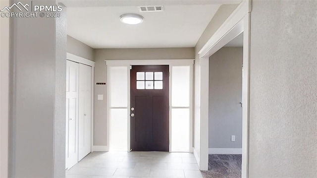 1636 Shenandoah Dr, Colorado Springs, CO 80910 - foyer featuring baseboards and a textured wall