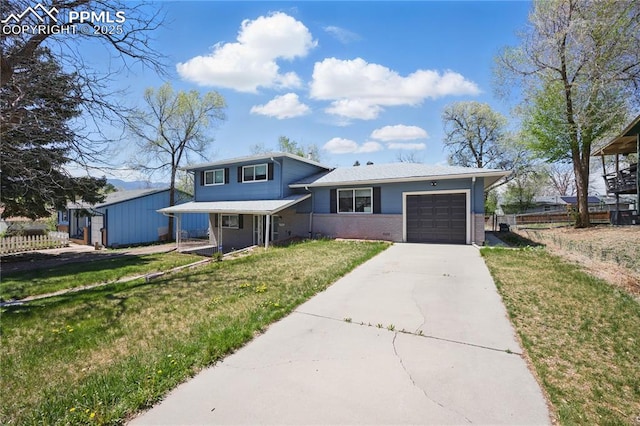1636 Shenandoah Dr, Colorado Springs, CO 80910 - split level home with an attached garage, concrete driveway, brick siding, and a porch